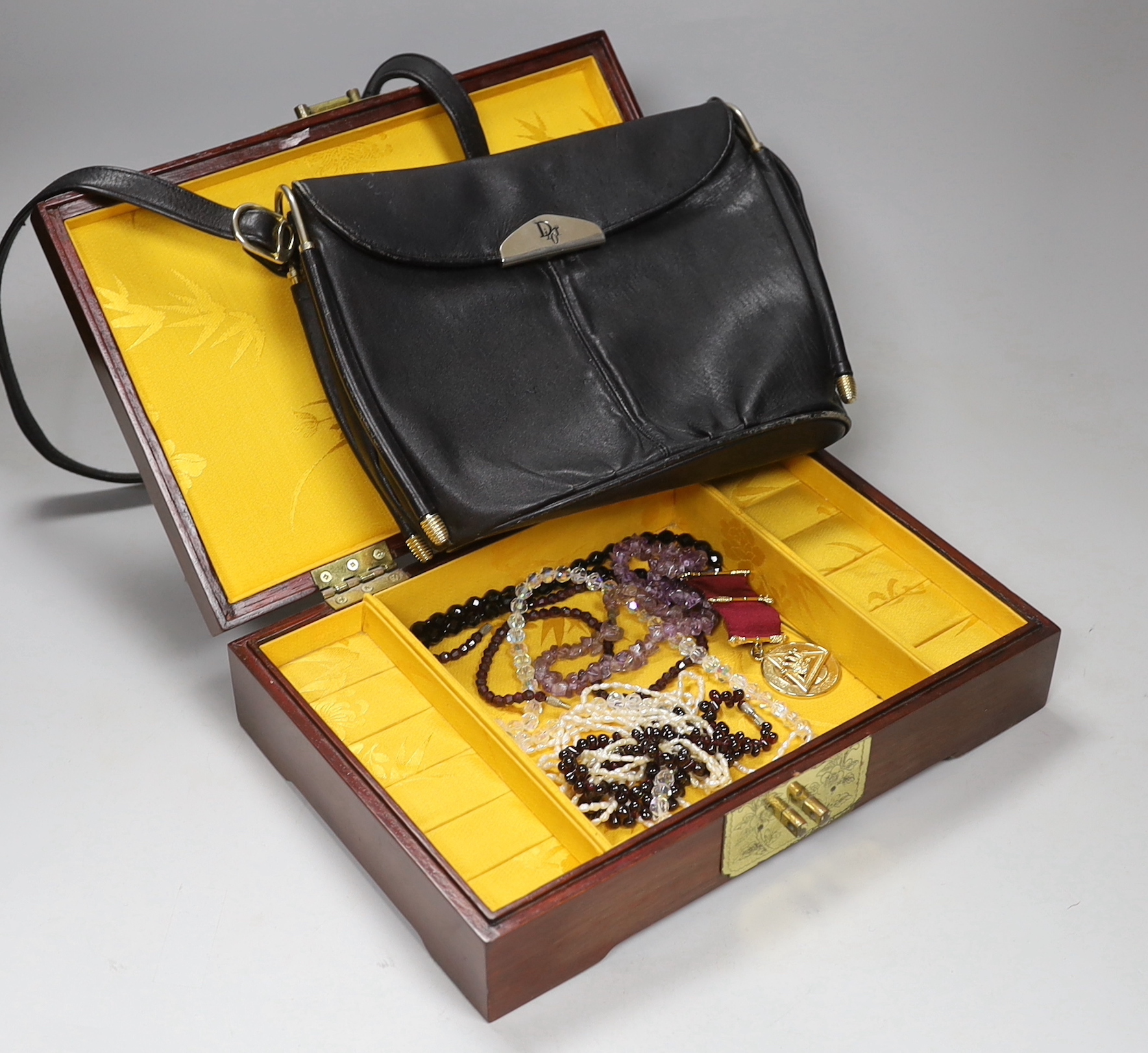 A Dior handbag, tiger's eye bead necklace and other costume jewellery
